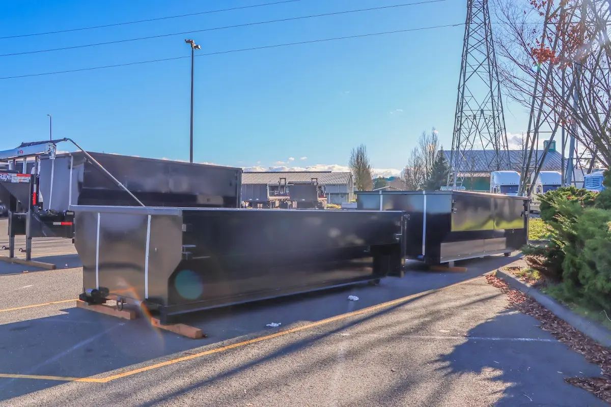 Roll-off dumpster ready for waste disposal at job site for Concrete Dumpster Rental in Ardmore